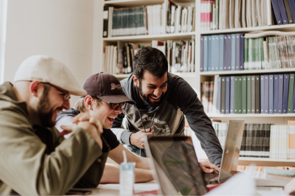 Student collaborating in a library